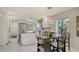 Modern kitchen with white cabinets, marble floors, and stainless steel appliances at 6450 Wild Oak Bay Blvd # 238, Bradenton, FL 34210