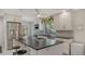 Updated kitchen island with stainless steel appliances at 6450 Wild Oak Bay Blvd # 238, Bradenton, FL 34210