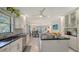 Open concept kitchen with breakfast bar and view to living area at 6450 Wild Oak Bay Blvd # 238, Bradenton, FL 34210