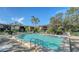 Inviting community pool and spa with plenty of lounge space at 6450 Wild Oak Bay Blvd # 238, Bradenton, FL 34210