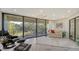 Relaxing sunroom with floor-to-ceiling windows and patio access at 6450 Wild Oak Bay Blvd # 238, Bradenton, FL 34210