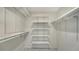 Large walk-in closet with ample shelving and hanging space at 6450 Wild Oak Bay Blvd # 238, Bradenton, FL 34210