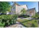Inviting townhouse featuring well-maintained landscaping, a private entrance and attached garage at 6750 Fairway Gardens Dr # 6750, Bradenton, FL 34203