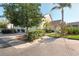 Beautiful home featuring lush landscaping, a private entrance, attached garage, and mature shade trees at 6750 Fairway Gardens Dr # 6750, Bradenton, FL 34203
