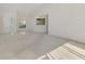 Bright and airy living room featuring neutral tones, high ceilings and plenty of natural light at 6750 Fairway Gardens Dr # 6750, Bradenton, FL 34203