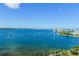 Aerial view of Sarasota Bay, featuring numerous sailboats and the city skyline in the distance at 72 N School Ave, Sarasota, FL 34237
