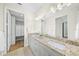 Double vanity bathroom with granite countertop at 72 N School Ave, Sarasota, FL 34237
