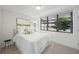 Cozy bedroom with large window and comfortable bed at 72 N School Ave, Sarasota, FL 34237