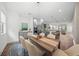 Bright dining room with wood table and seating for six, near the kitchen at 72 N School Ave, Sarasota, FL 34237