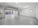 Spacious garage with epoxy flooring and ample storage at 72 N School Ave, Sarasota, FL 34237