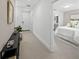 Bright hallway with tile flooring, leading to bedroom and entry at 72 N School Ave, Sarasota, FL 34237