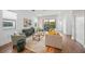 Bright living room with hardwood floors and access to balcony at 72 N School Ave, Sarasota, FL 34237