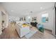Spacious living room with hardwood floors and open floor plan at 72 N School Ave, Sarasota, FL 34237