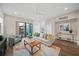 Modern living room with comfy sofa and access to balcony at 72 N School Ave, Sarasota, FL 34237