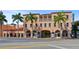 Historic opera house with palm trees in front at 72 N School Ave, Sarasota, FL 34237