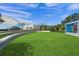 Modern outdoor stage with a grassy area at 72 N School Ave, Sarasota, FL 34237
