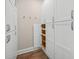 Well-organized pantry with ample shelving and white cabinets at 72 N School Ave, Sarasota, FL 34237