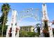 Image of the iconic Sarasota Bayfront Arch, a landmark entrance to the bayfront area at 72 N School Ave, Sarasota, FL 34237