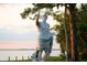 White statue of a Roman emperor by the water at 72 N School Ave, Sarasota, FL 34237