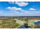 Aerial view of golf course and neighborhood at 7244 Orchid Island Pl, Bradenton, FL 34202