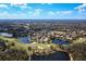 Expansive aerial view of community and golf course at 7244 Orchid Island Pl, Bradenton, FL 34202