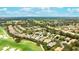 Aerial view of home in a golf course community at 7244 Orchid Island Pl, Bradenton, FL 34202