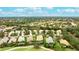 Aerial view of home in a luxury golf community at 7244 Orchid Island Pl, Bradenton, FL 34202