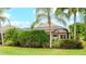 Private backyard oasis with lush landscaping at 7244 Orchid Island Pl, Bradenton, FL 34202