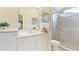 Bathroom with shower, toilet, and vanity with white cabinets at 7244 Orchid Island Pl, Bradenton, FL 34202