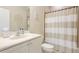 Bathroom with shower/tub combo, toilet, and vanity at 7244 Orchid Island Pl, Bradenton, FL 34202
