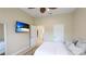 Bedroom with queen bed, TV and access to bathroom at 7244 Orchid Island Pl, Bradenton, FL 34202