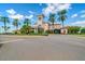 Impressive clubhouse entrance with palm trees at 7244 Orchid Island Pl, Bradenton, FL 34202