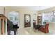 Bright dining area with a view into the living room at 7244 Orchid Island Pl, Bradenton, FL 34202