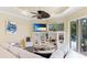 Gathering room with comfy seating and a view of the pool at 7244 Orchid Island Pl, Bradenton, FL 34202