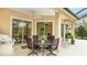 Outdoor patio with seating and grill at 7244 Orchid Island Pl, Bradenton, FL 34202
