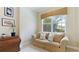 Sitting area with patterned couch and large window at 7244 Orchid Island Pl, Bradenton, FL 34202