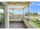 Screened balcony overlooking community, partial view at 7304 W Country Club N Dr # 213, Sarasota, FL 34243