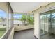 Screened balcony offering an outdoor space with partial view at 7304 W Country Club N Dr # 213, Sarasota, FL 34243