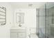 Updated bathroom, gray tile, glass shower, and new vanity at 7304 W Country Club N Dr # 213, Sarasota, FL 34243
