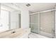 Clean bathroom with a shower/tub combo and updated vanity at 7304 W Country Club N Dr # 213, Sarasota, FL 34243