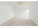 Spacious bedroom with carpet and window offering natural light at 7304 W Country Club N Dr # 213, Sarasota, FL 34243