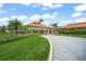 Landscaped entry to Palm Aire Country Club at 7304 W Country Club N Dr # 213, Sarasota, FL 34243