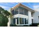 Two-story condo building with screened balconies at 7304 W Country Club N Dr # 213, Sarasota, FL 34243
