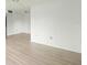 Bright living room featuring light wood flooring at 7304 W Country Club N Dr # 213, Sarasota, FL 34243