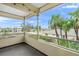 Spacious screened balcony overlooks lush landscape and community at 7304 W Country Club N Dr # 213, Sarasota, FL 34243