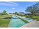 Community shuffleboard court with green surface at 7304 W Country Club N Dr # 213, Sarasota, FL 34243