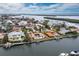 Wide aerial view of upscale waterfront community at 740 Old Compass Rd, Longboat Key, FL 34228