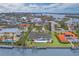 Waterfront property with pool and private dock, offering stunning water views at 740 Old Compass Rd, Longboat Key, FL 34228