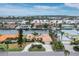 Bird's-eye view of waterfront home and neighborhood at 740 Old Compass Rd, Longboat Key, FL 34228