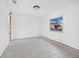 Simple bedroom with tile floor and window at 740 Old Compass Rd, Longboat Key, FL 34228